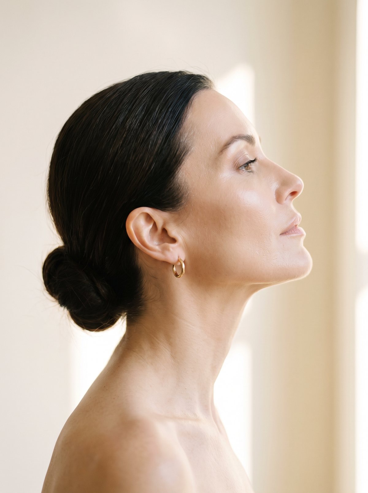 A pure side profile showing a clean jawline and long neck