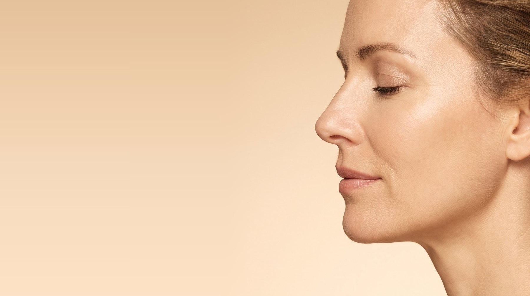 A lifted cheekbone and defined jaw in three-quarter view